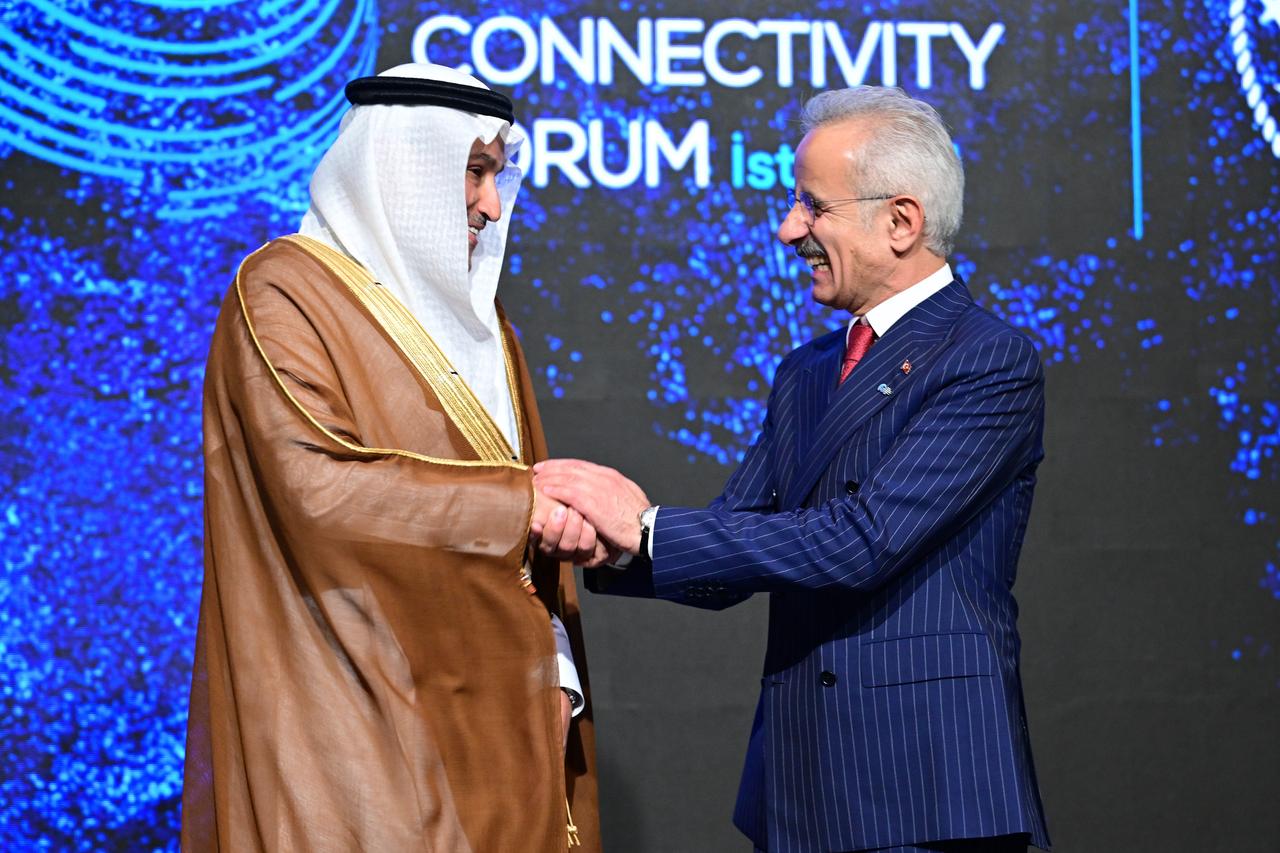 Türkiye’s Transport and Infrastructure Minister Abdulkadir Uraloglu (right) shakes hands with Saudi Arabia’s Minister of Transport and Logistics Services Saleh Al-Jasser during the Global Transport Connectivity Forum in Istanbul, Türkiye, on June 28, 2025. (AA Photo)