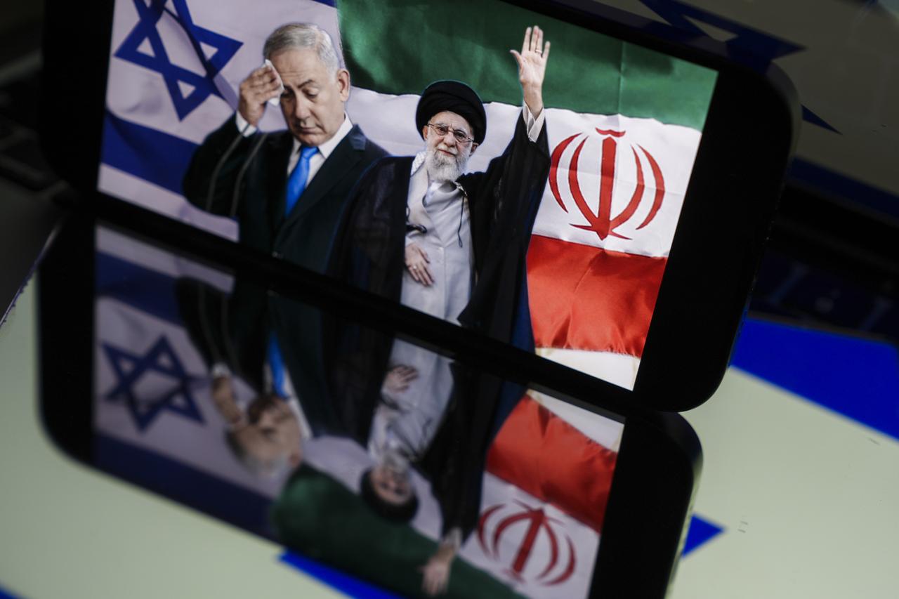 In this photo illustration, Iranian Supreme Leader Ayatollah Ali Khamenei and Israeli Prime Minister Benjamin Netanyahu are seen on a screen, in Ankara, Türkiye on June 24, 2025. (AA Photo)