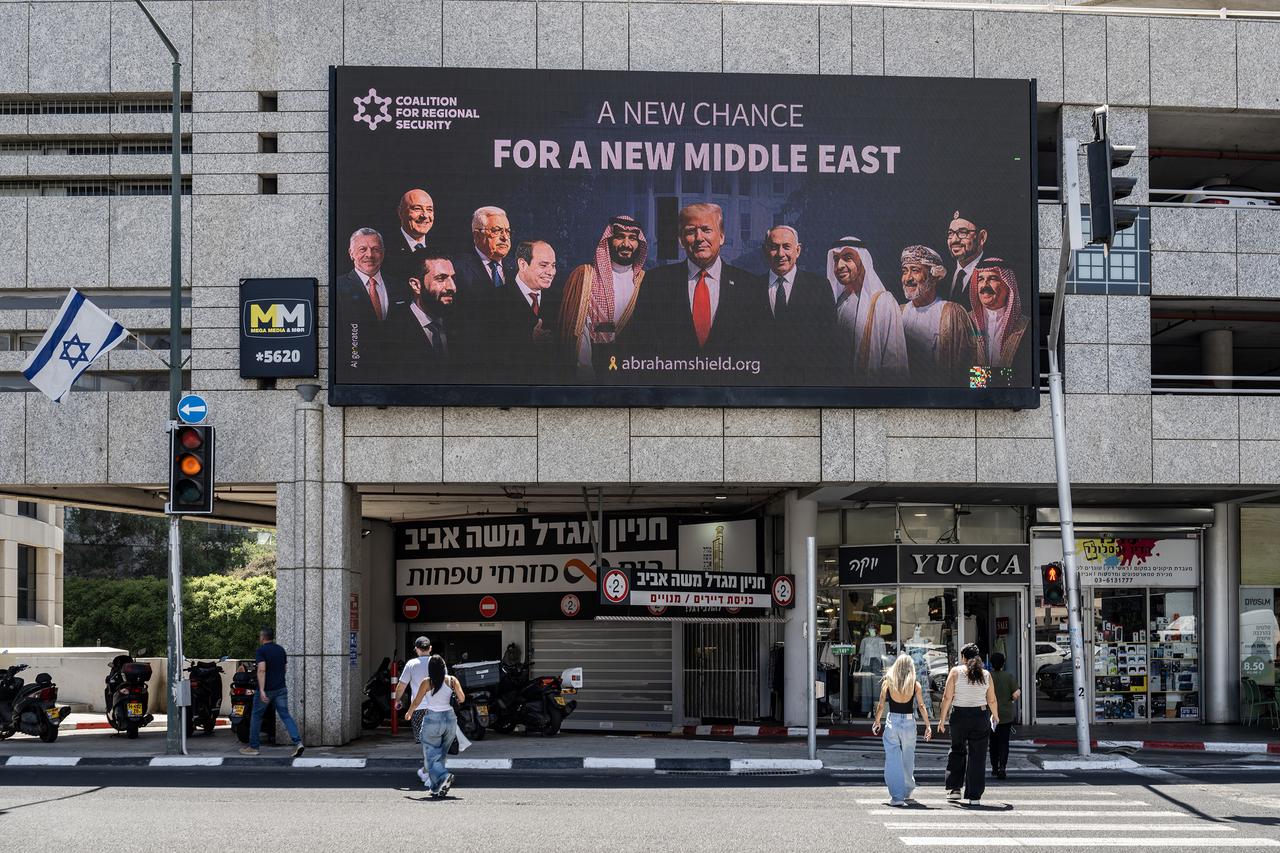 A large poster depicting Saudi Arabia, Syria, Oman, and Lebanon leaders alongside U.S. President Donald Trump and Israeli Prime Minister Benjamin Netanyahu is placed on a billboard to highlighting the push for diplomatic relations in Tel Aviv, Israel on June 26, 2025. (AA Photo)