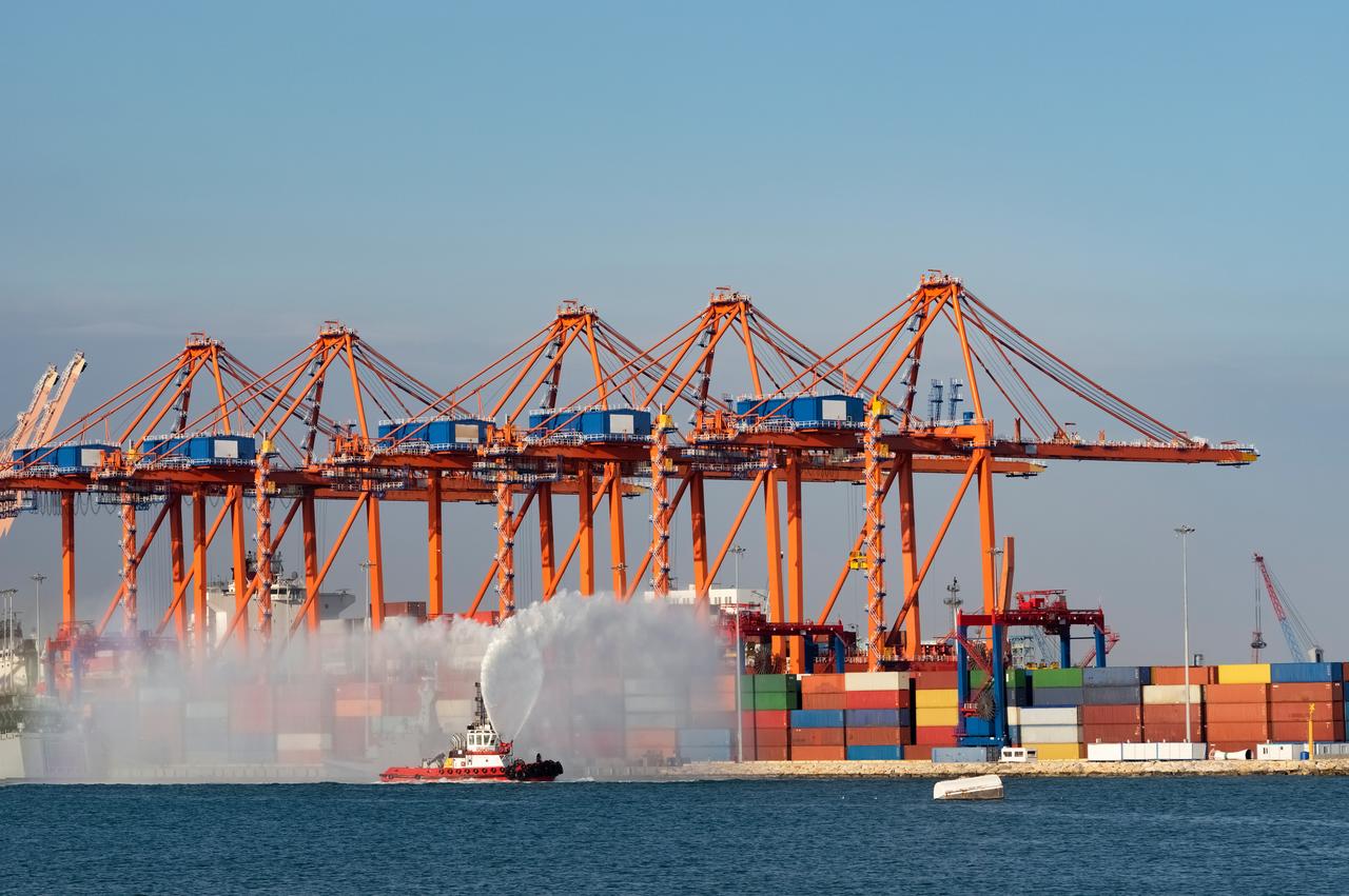 A tug boat sprays water during operations at Mersin Port, one of the largest container ports located on the eastern Mediterranean coast in Türkiye, accessed on June 3, 2025. (Adobe Stock Photo)