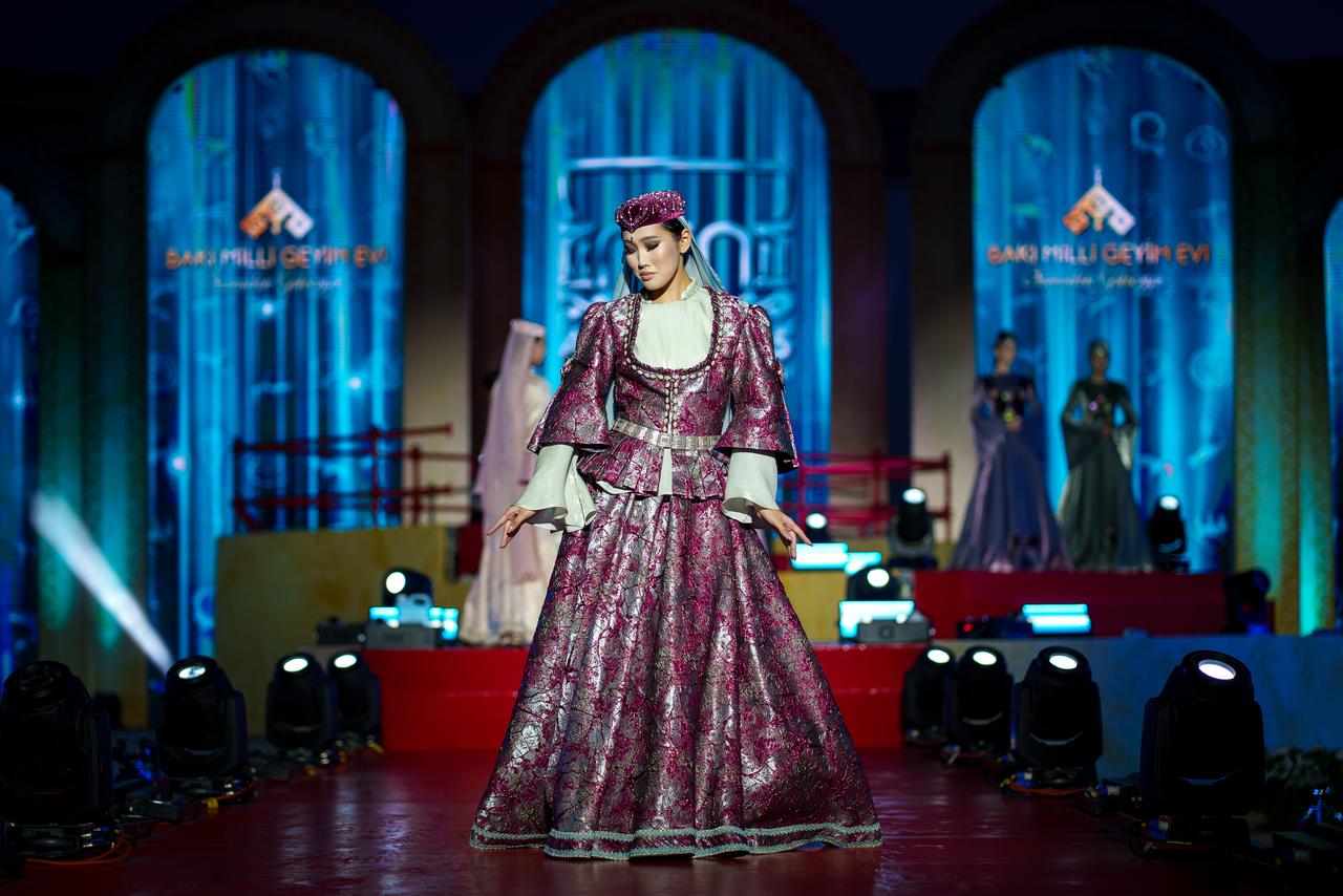 Models present traditional Turkish clothing within the framework of the 8th Turkic World Women and Fashion Festival at the Aktau Amphitheatre in Aktau, Kazakhstan, June 29, 2025. (AA Photo)
