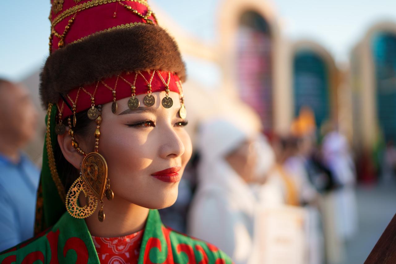 Models present traditional Turkish clothing within the framework of the 8th Turkic World Women and Fashion Festival at the Aktau Amphitheatre in Aktau, Kazakhstan, June 29, 2025. (AA Photo)