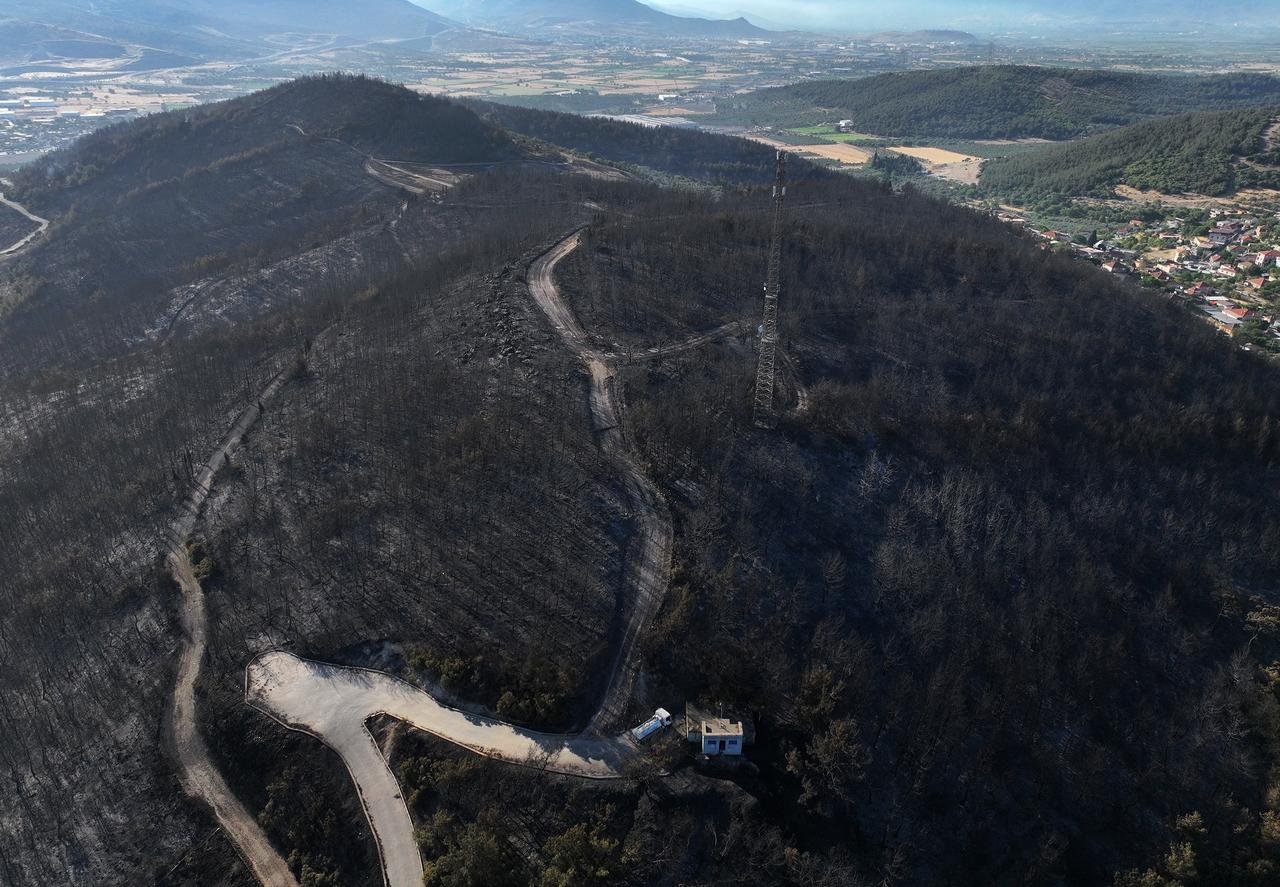 An aerial view of the aftermath of the fire that broke out in Aliaga district of Izmır, Türkiye, June 26, 2025. (AA Photo)