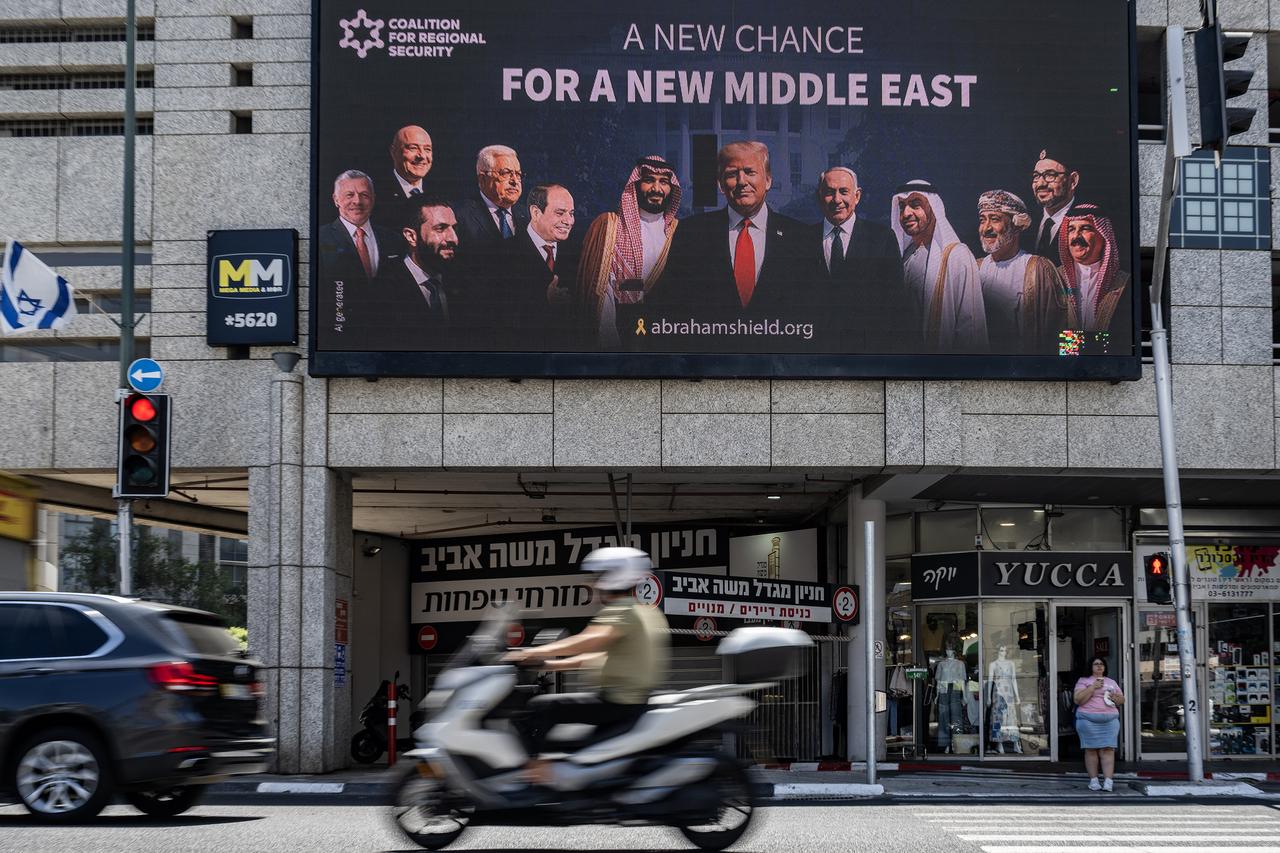 A large poster depicting Saudi Arabia, Syria, Oman, and Lebanon leaders alongside U.S. President Donald Trump and Israeli Prime Minister Benjamin Netanyahu is placed on a billboard to highlighting the push for diplomatic relations in Tel Aviv, Israel on June 26, 2025. (AA Photo)