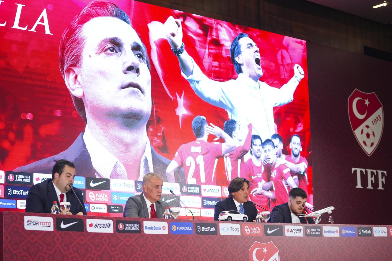 TFF President Ibrahim Haciosmanoglu (2nd left), board members and coach Montella (2nd right) attended the ceremony at Hasan Dogan Training Facility. (AA Photo)