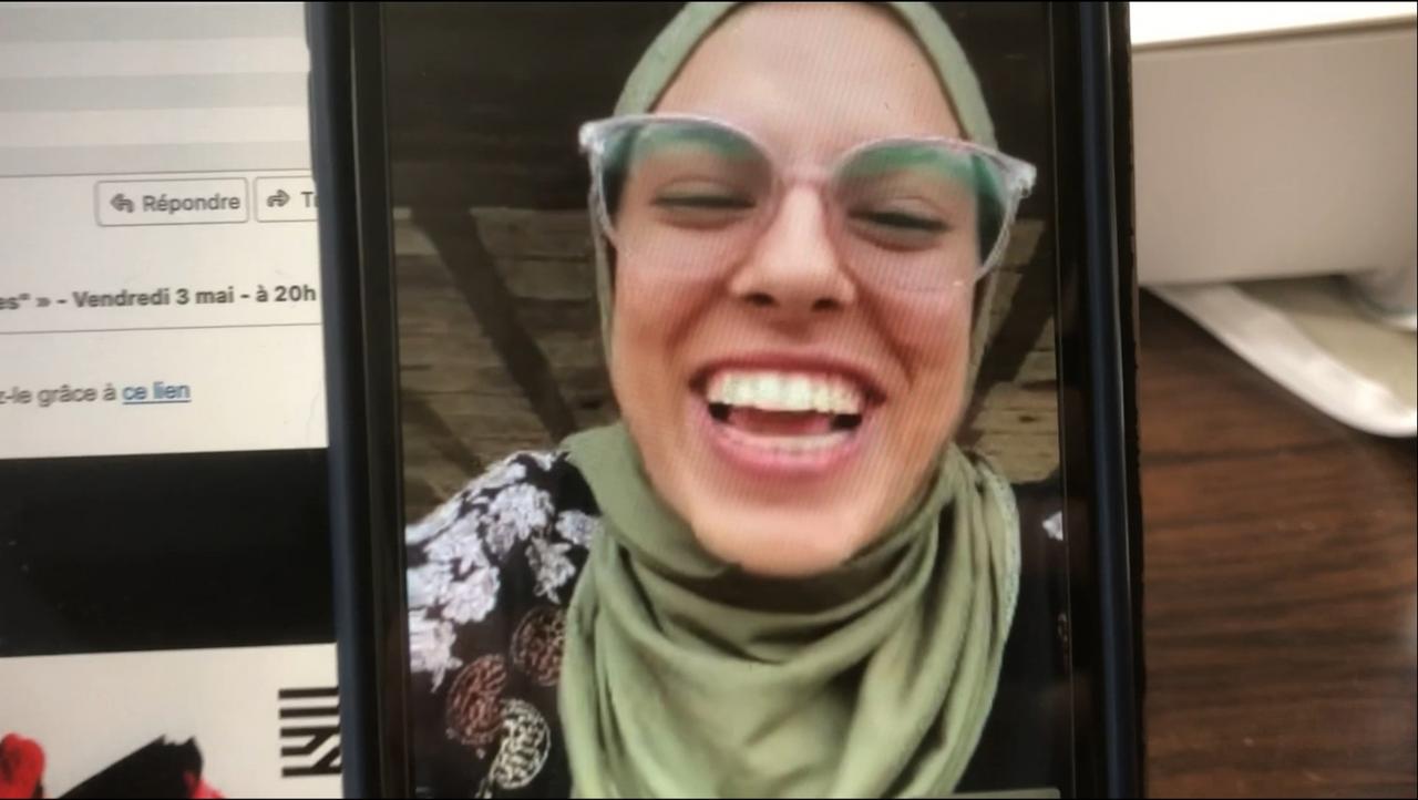 Palestinian photojournalist and artist Fatma Hassona is seen during a virtual call in 2025. (Screenshot from Put Your Soul in Your Hand and Walk)
