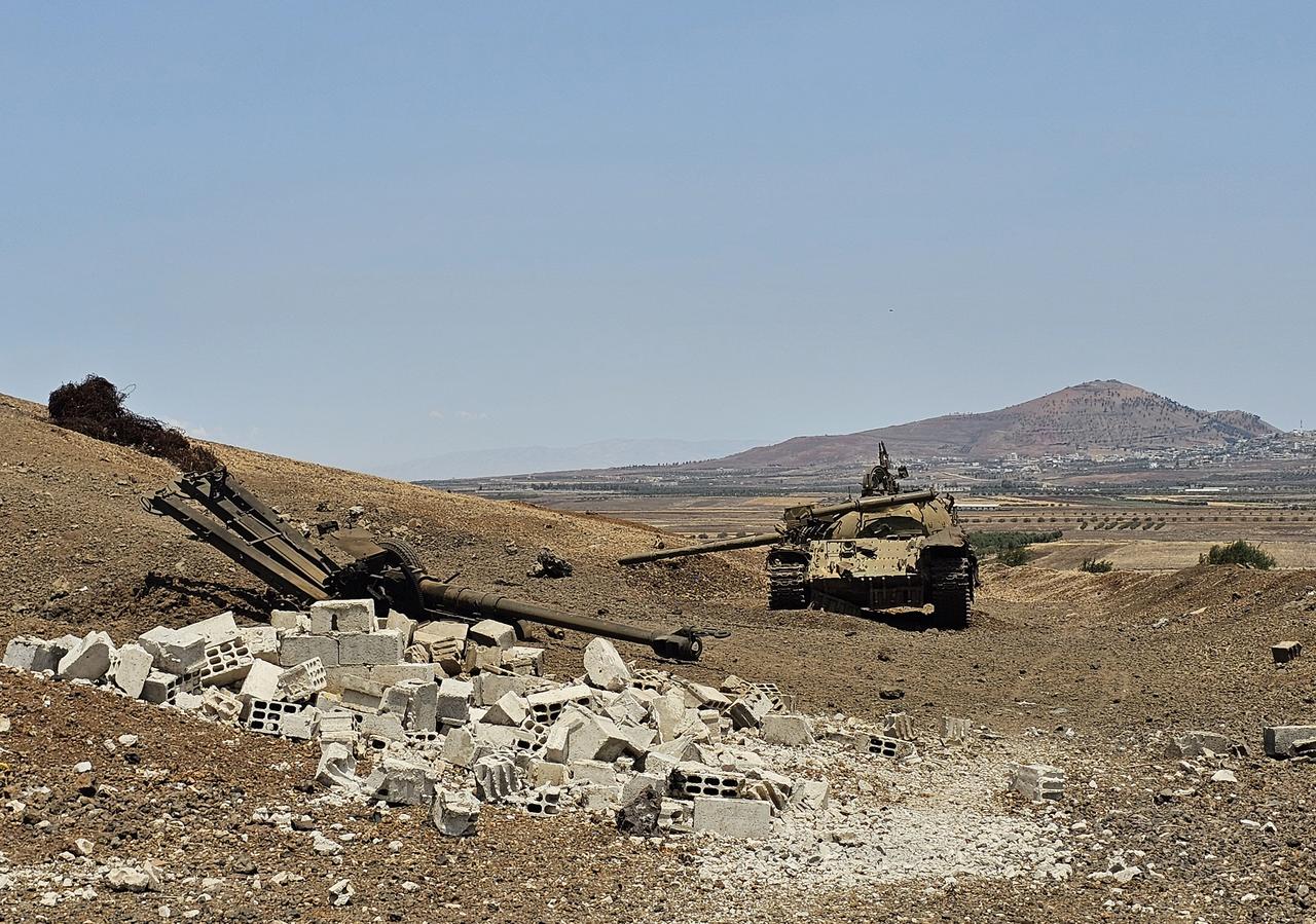  A view of damaged Syrian army tanks and other heavy weapons is seen in the Yarmouk area, after Israeli artillery fire hit the area in response to rockets allegedly launched into Daraa, Syria, on June 04, 2025. (AA Photo)