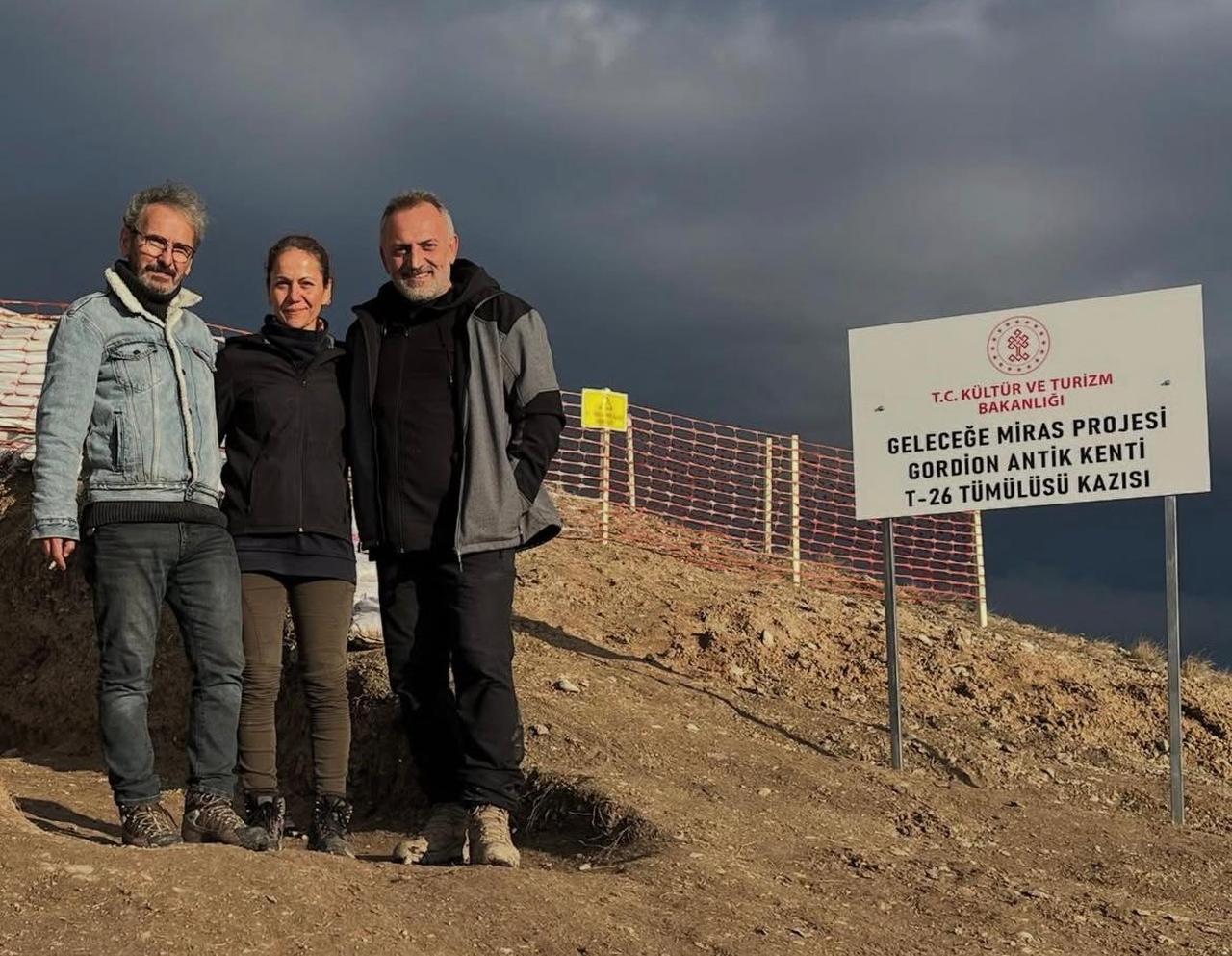 Following the excavation work at Tumulus T26 in the ancient city of Gordion in Ankara, Türkiye, scientific advisor Professor S. Yucel Senyurt (L), Assistant Professor Leyla Yorulmaz (C), and Professor Atakan Akcay (R) pose for a photo, Jan. 5, 2025. (Photo via Instagram/@atakanakcayyy)