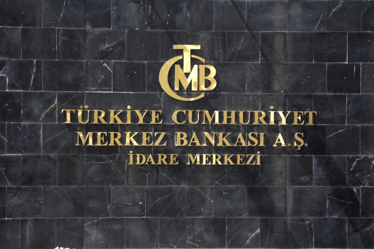 A picture shows the logo of Türkiye's Central Bank (CBRT) at the entrance of the bank's headquarters in Ankara, Türkiye. (AFP Photo)