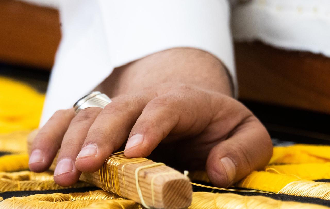 Saudi workers embroider Islamic calligraphy, using either pure silver threads or silver threads plated with gold, during the final stages in the preparation of a drape, or Kiswa, that covers the Kaaba, a cube-shaped structure at the heart the Grand Mosque, at the Kiswa factory in Mecca, Saudi Arabia, May 29, 2025. (Photo via X/@FotoNugget)