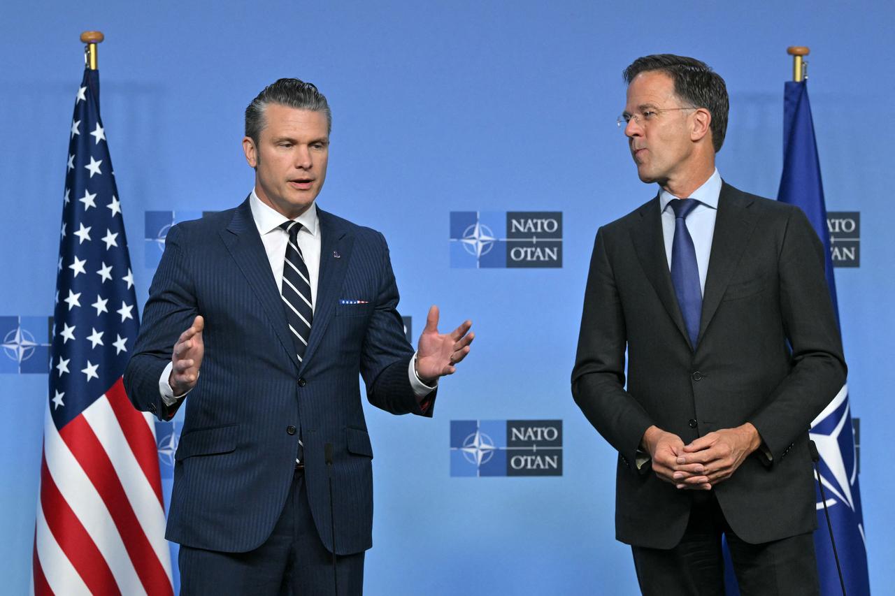 NATO Secretary General Mark Rutte (R) and US Secretary of Defence Pete Hegseth deliver remarks before a Defence Ministers meeting at the NATO headquarters, in Brussels, on June 5, 2025. (AFP Photo)