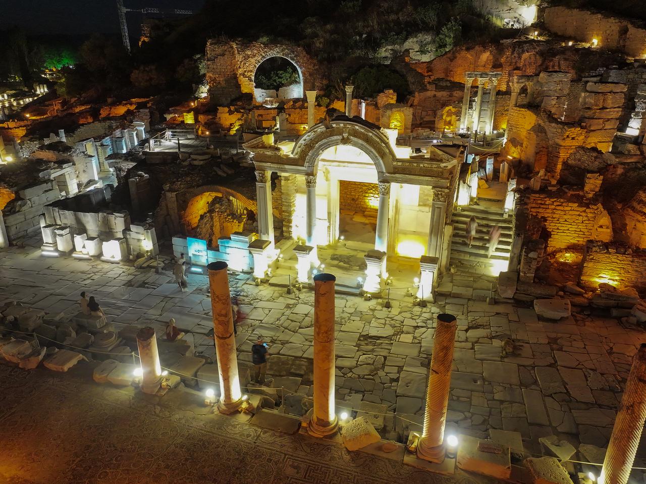 The ancient city of Ephesus in Izmir, Türkiye, a UNESCO World Heritage Site, welcomes visitors after sunset as part of the Ministry of Culture and Tourism's new “night museum” initiative, June 4, 2025. (AA Photo)