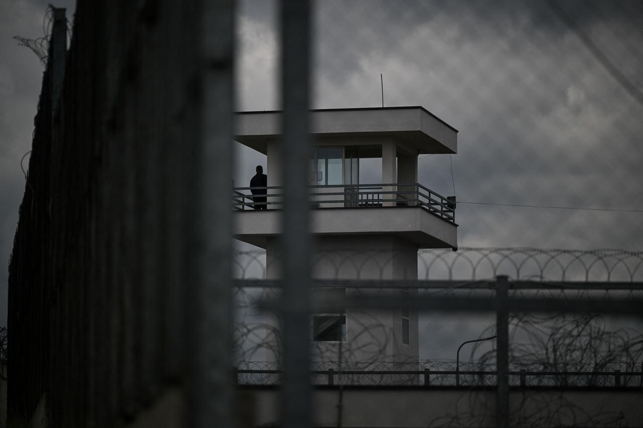 Police officer at the observation and surveillance tower of the Pasjan prison, in the outskirts of the town of Gjilan, southeastern Kosovo on May 30, 2025. (AFP Photo)