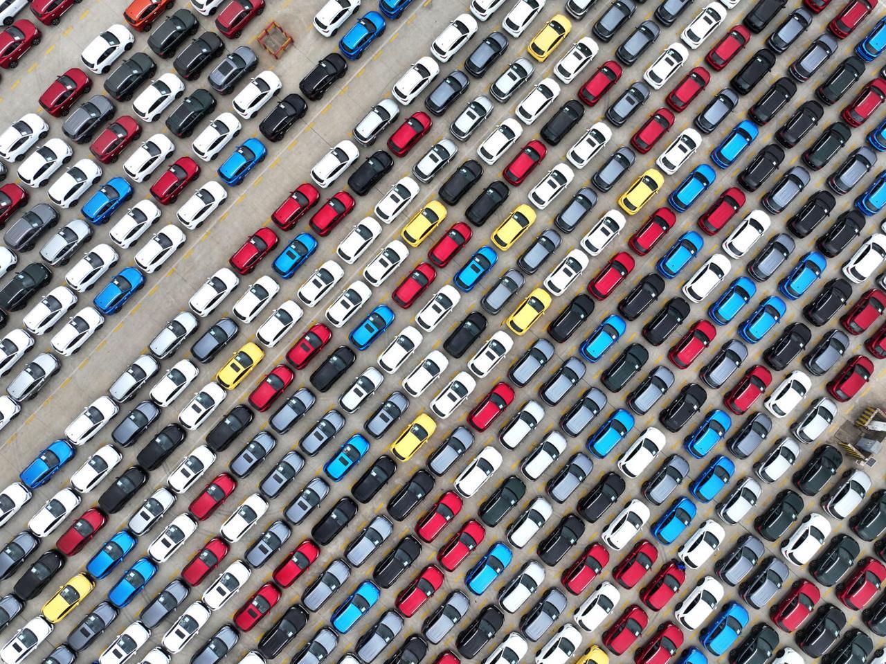 This photo taken on January 23, 2025 shows cars waiting to be exported in a port in Lianyungang, east Chinas Jiangsu province. (AFP Photo)