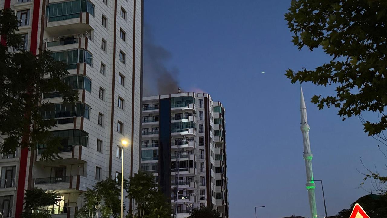 Smoke rises from a 13-story residential building in Diyarbakir, Türkiye on June 5, 2025. (AA Photo)