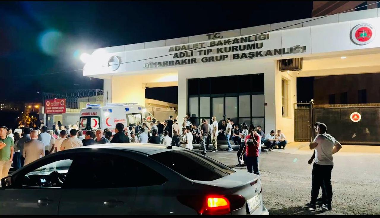 Families and relatives gather outside the Diyarbakır Forensic Medicine Institute following a fatal fire that claimed four lives, including three children, on June 5, 2025. (AA Photo)