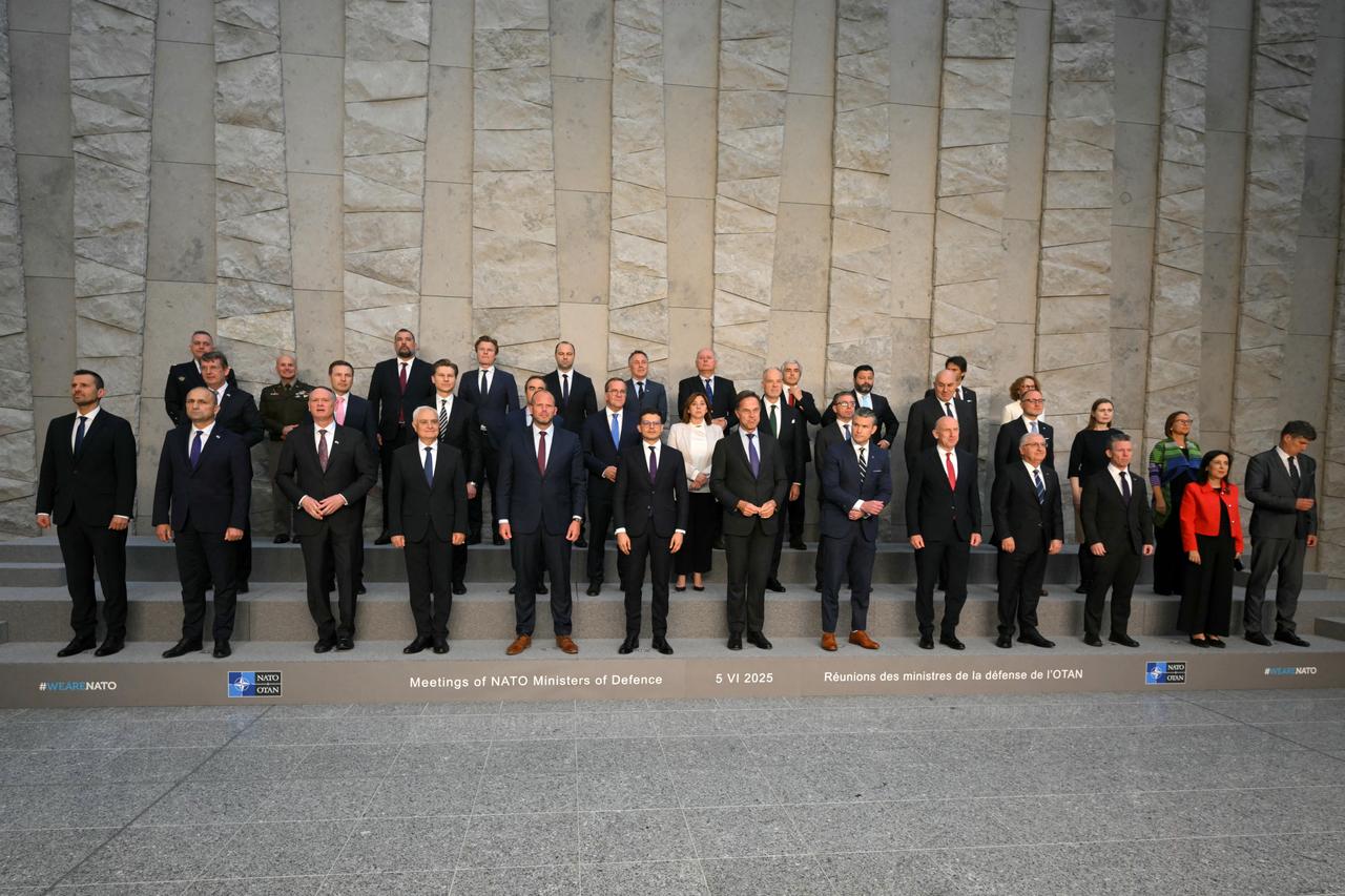 NATO Secretary General Mark Rutte poses with Defence Ministers during a family picture on the sidelines of a NATO Defence Ministers meeting at the NATO headquarters, in Brussels, on June 5, 2025. (Photo by NICOLAS TUCAT / AFP)
