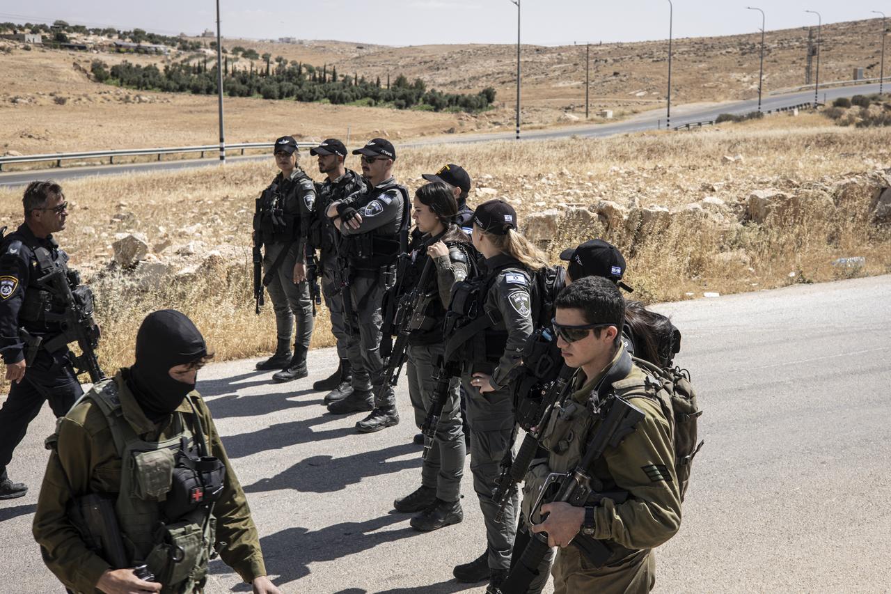 Israeli security forces block the entrance to the village of al-Tuwani in the Masafer Yatta area in Occupied West Bank on June 2, 2025. (Photo by JOHN WESSELS / AFP)