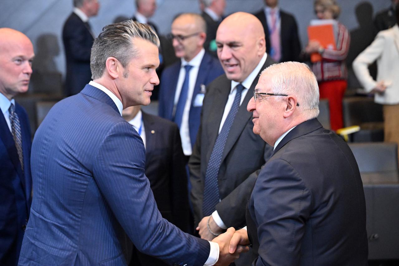 BRUSSELS, BELGIUM - JUNE 05: Turkish Defense Minister Yasar Guler (R) and US Secretary of Defense Pete Hegseth (L) attend a Defense Ministers meeting at the NATO headquarters, in Brussels, Belgium on June 5, 2025.    ( Dursun Aydemir - Anadolu Agency )