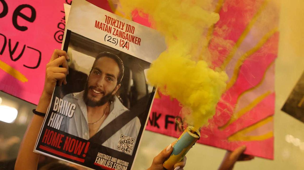 A demonstrator holds up a portrait of hostage Matan Zangauker during an anti-government protest calling for an end to the war,  in front of the Israeli Defence Ministry in Tel Aviv on May 17, 2025. (AFP Photo)