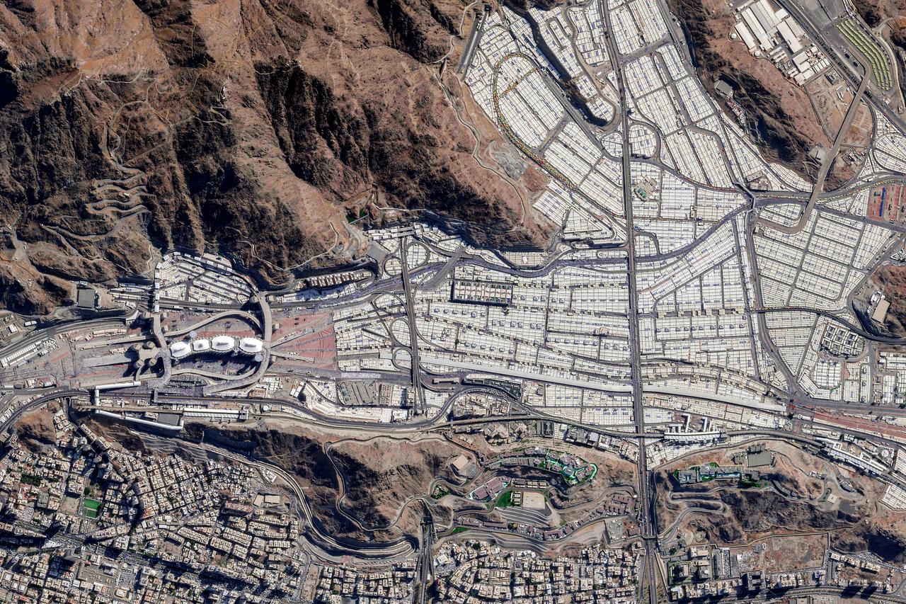 A satellite image from Planet Labs PBC shows the Jamarat Bridge and pilgrims' tents in Mina during the first day of Eid al-Adha and the annual Hajj pilgrimage in Mina, Saudi Arabia, on June 6, 2025. (AFP Photo)