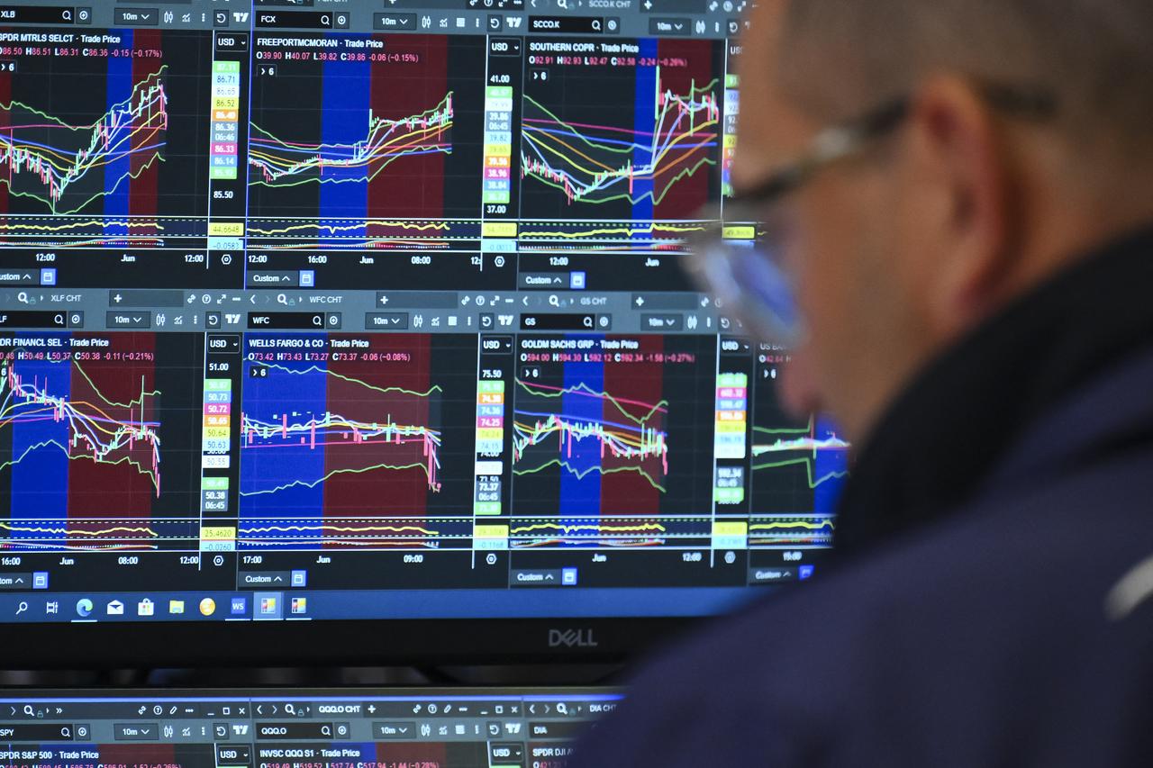 A trader works on the floor of the New York Stock Exchange (NYSE) at the opening bell in New York City, on June 2, 2025. (AFP Photo)