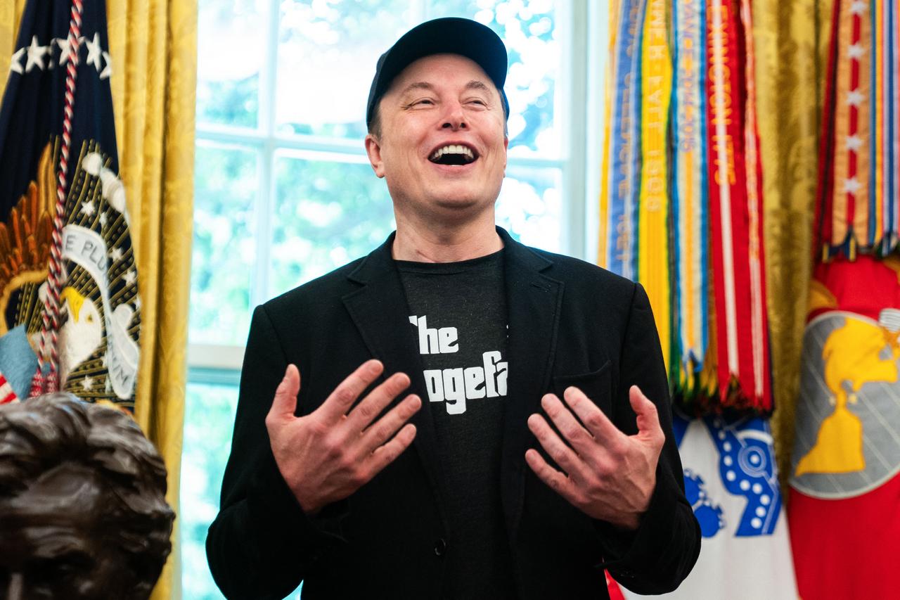 Elon Musk speaks during a news conference with US President Donald Trump in the Oval Office of the White House in Washington, DC, on May 30, 2025. Musk, who stormed into US politics as President Trumps chainsaw-brandishing sidekick, announced on May 28 that he is leaving his role in US government, intended to reduce federal spending, shortly after his first major break with the President over Trumps signature spending bill. (Photo by Allison ROBBERT / AFP)