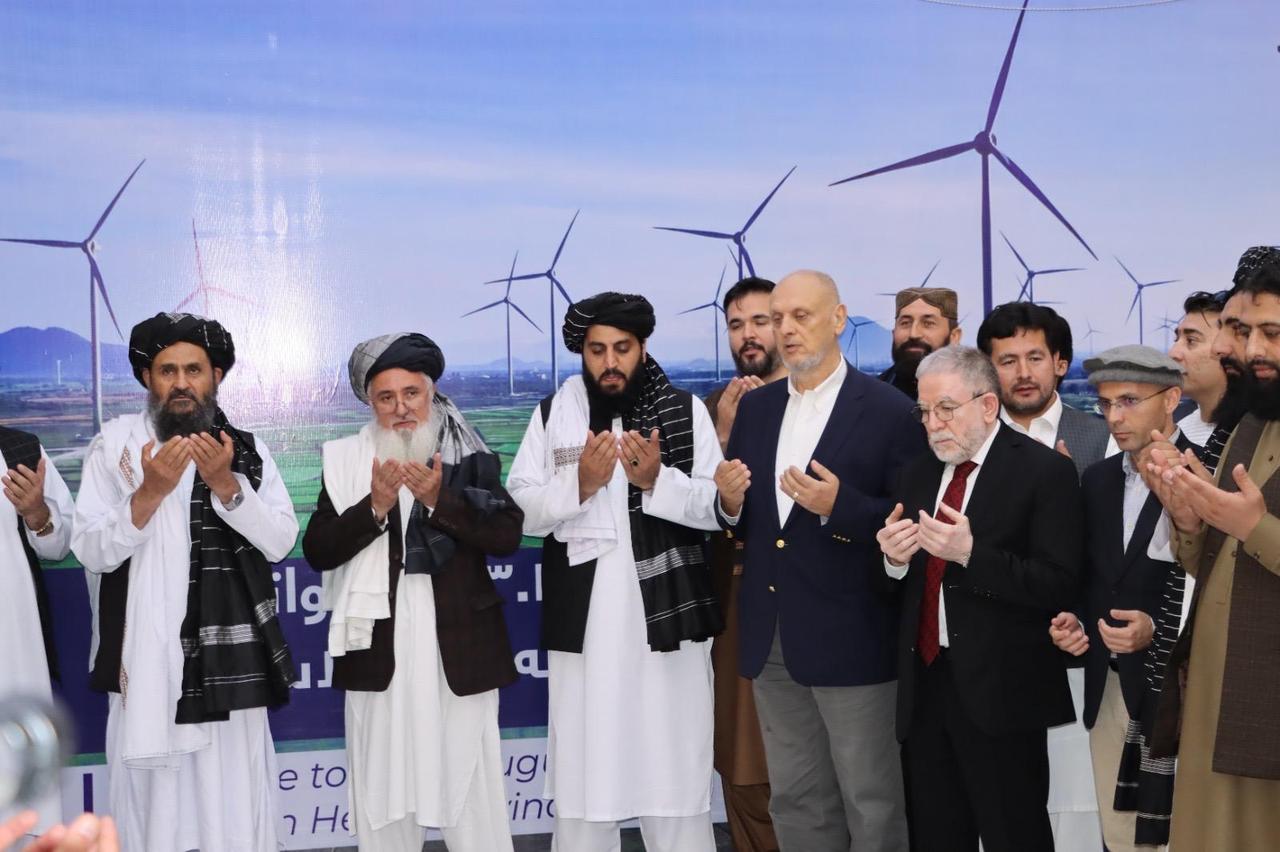 Representatives from 77 Insaat, Türkiye’s Consul General in Herat Emre Unal, and local Afghan officials pose for a photo during the groundbreaking ceremony of a 200-megawatt wind power project in Herat, Afghanistan, on June 7, 2025. (AA Photo)