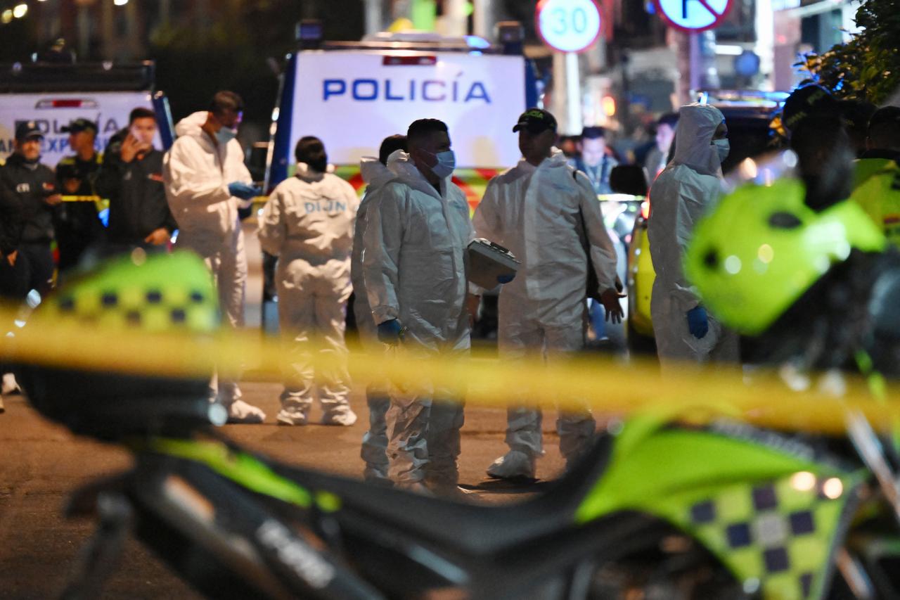 Forensic experts work at the crime scene where Senator Miguel Uribe was shot and wounded in the Modelia neighborhood in Bogota on June 7, 2025. (AFP Photo)