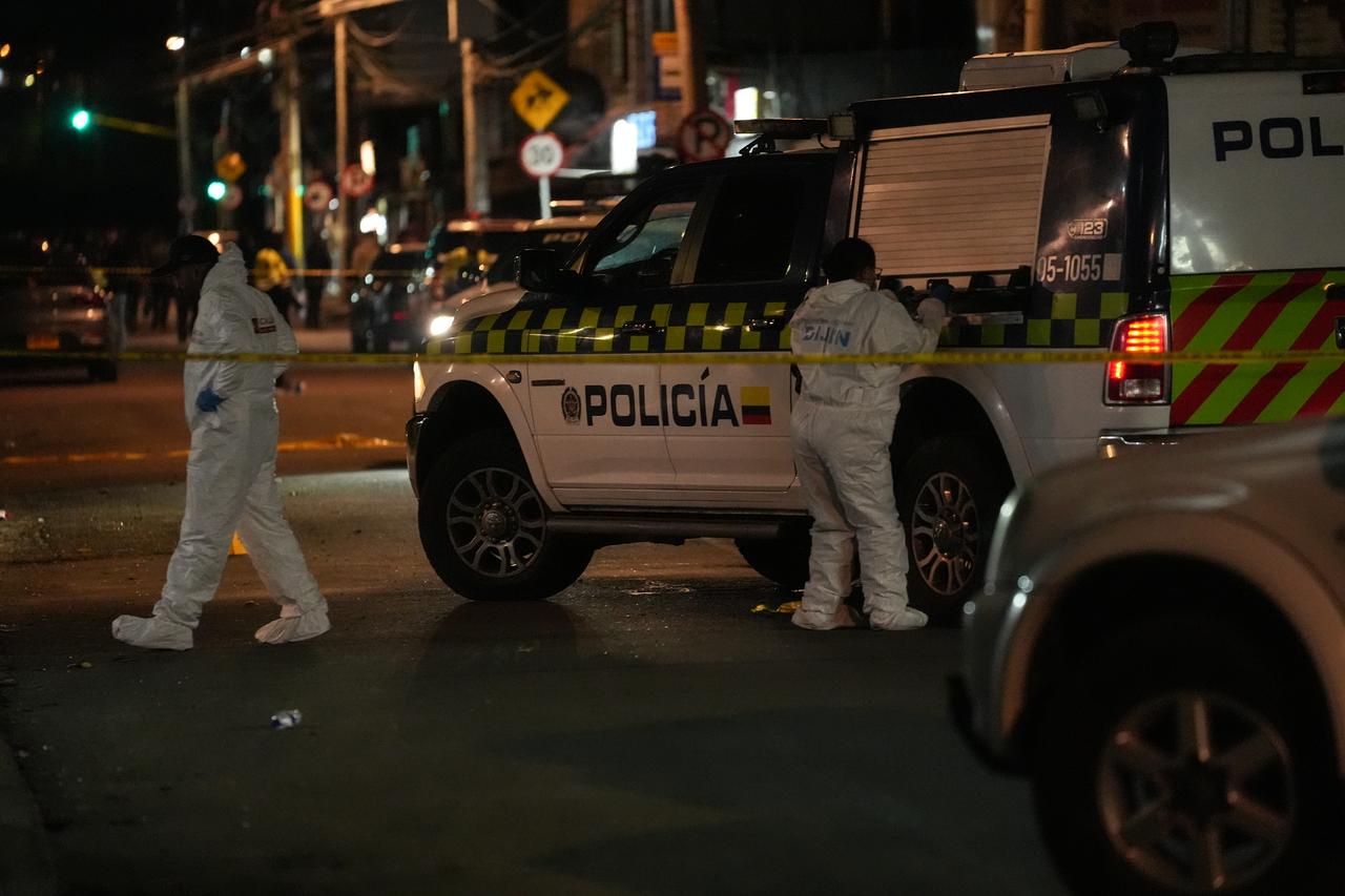 Forensic investigators examine the scene where Senator Miguel Uribe Turbay was shot and injured in the Modelia neighborhood of Bogota, Colombia on June 7, 2025. (AFP Photo)