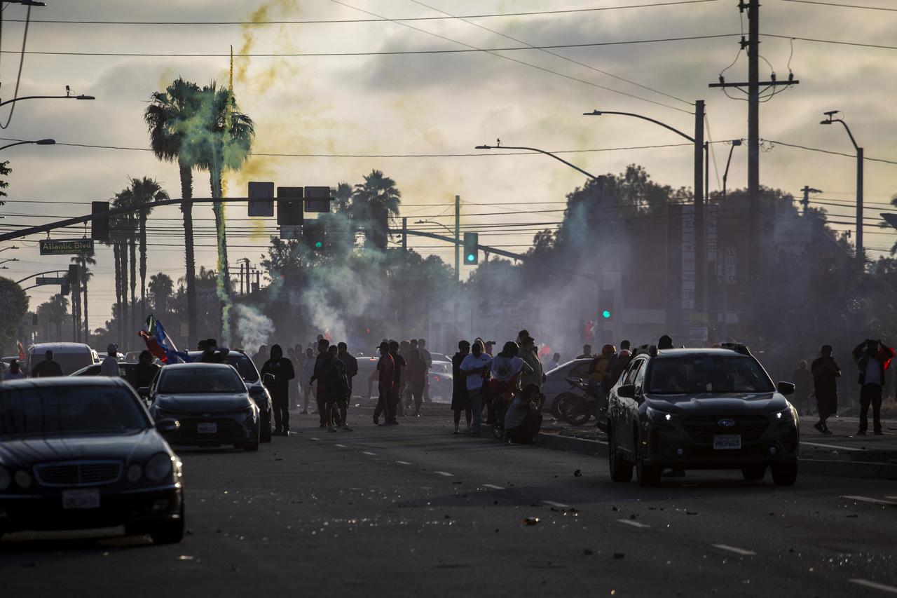 Law enforcement clashes with demonstrators during a protest following federal immigration operations, in the Compton neighborhood of Los Angeles, California on June 7, 2025. (AFP Photo)