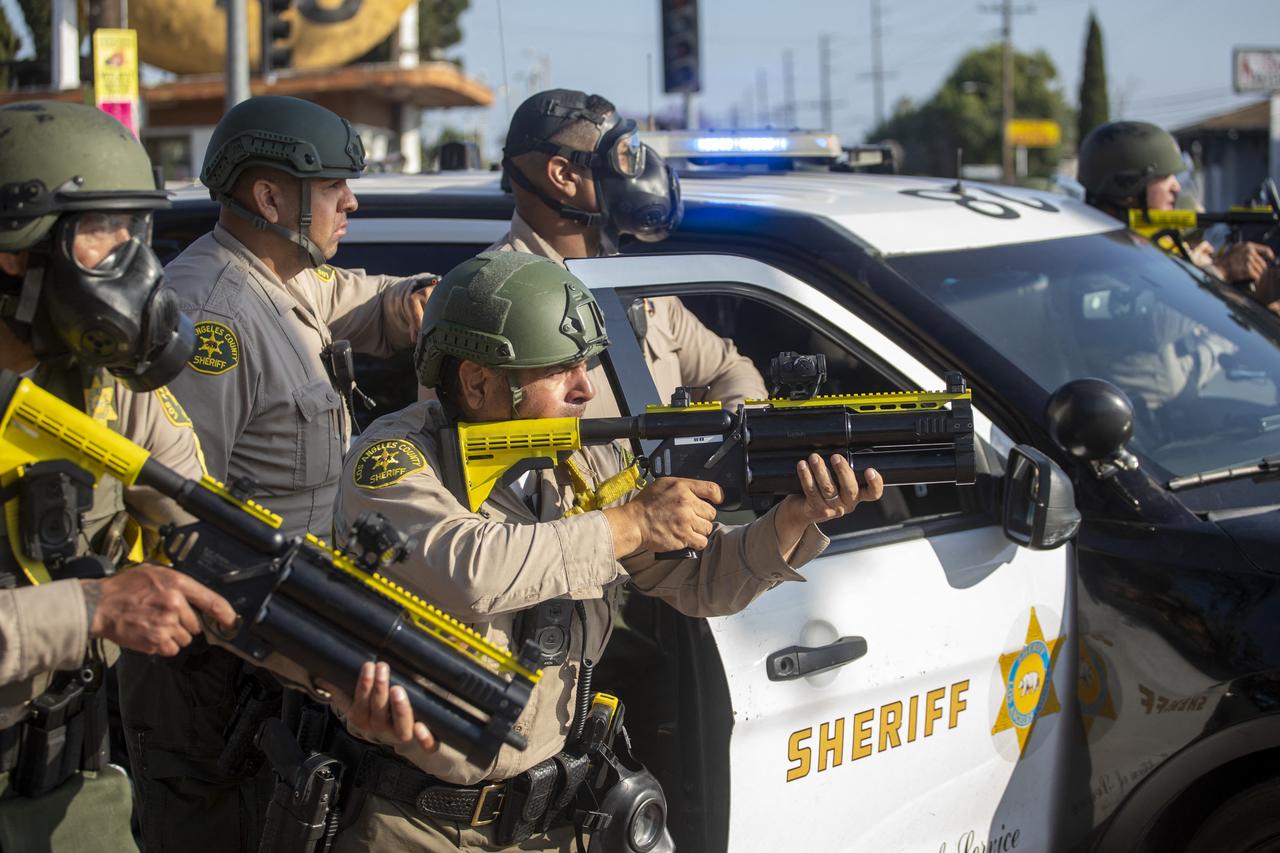 Law enforcement confronts demonstrators during a protest following federal immigration operations, in the Compton neighborhood of Los Angeles, California on June 7, 2025. (AFP Photo)
