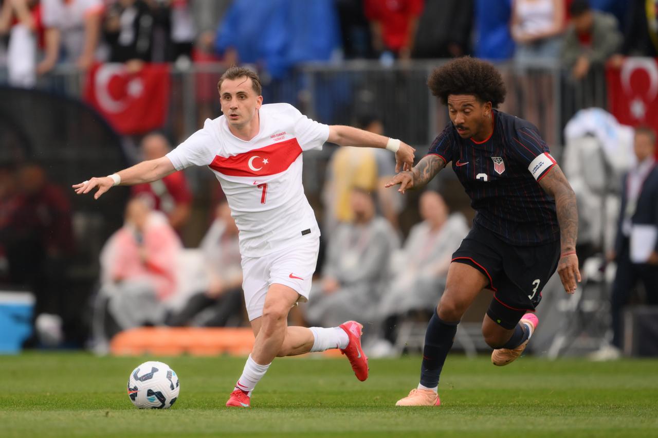 Kerem Akturkoglu (7) of Türkiye in action against Chris Richards (3) of USA during the friendly match between Turkiye and USA at Pratt & Whitney Stadium at Rentschler Field in East Hartford, Connecticut, United States on June 7, 2025. (AA Photo)