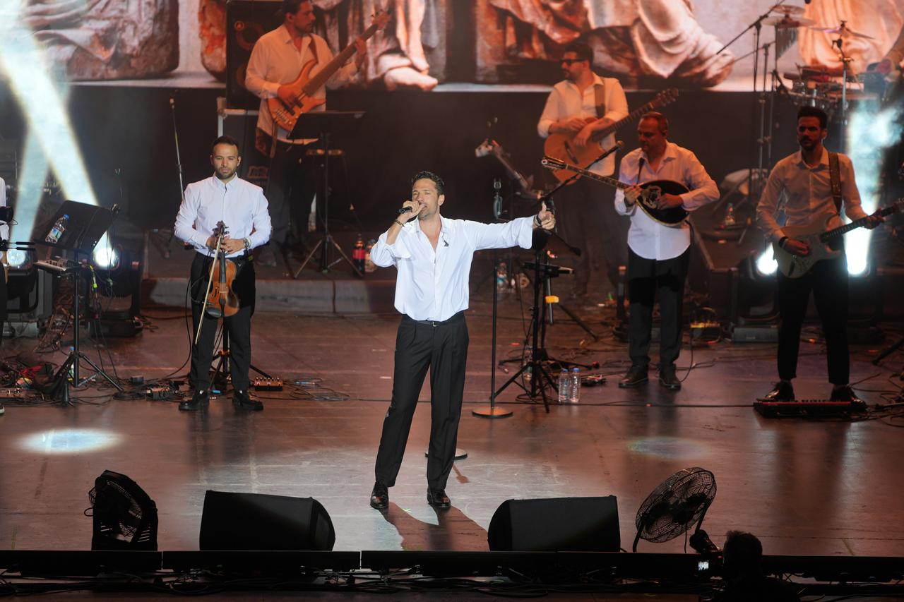 Konstantinos Argiros, one of Greece's leading artists, performed his first-ever concert in Türkiye at the Harbiye Cemil Topuzlu Open-Air Theatre, Istanbul, Türkiye, July 10, 2025. (AA Photo)