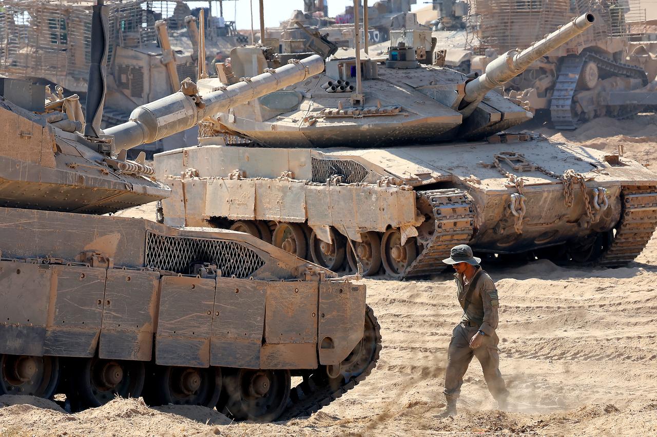 Israeli troops deploy by Israel's border fence with the Gaza Strip on July 10, 2025. (AFP Photo)
