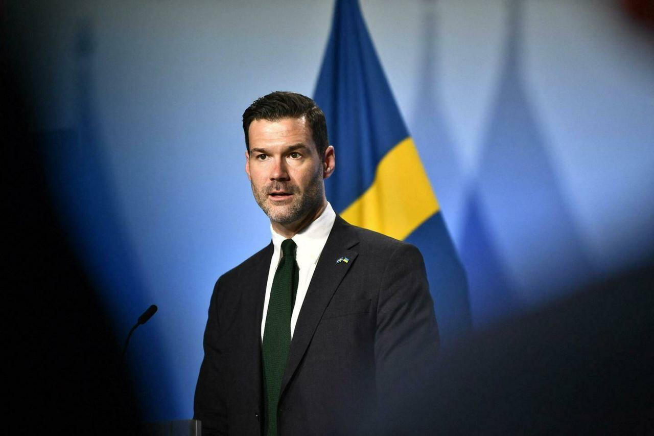 Swedish migration minister ‘shocked’ after son’s ties to far-right groups revealed