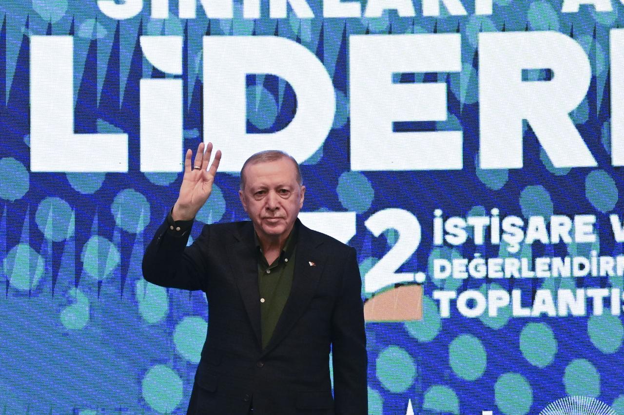 President Recep Tayyip Erdogan greets the crowd during the 32nd Consultation and Evaluation Meeting in Ankara, Türkiye, July 12, 2025.