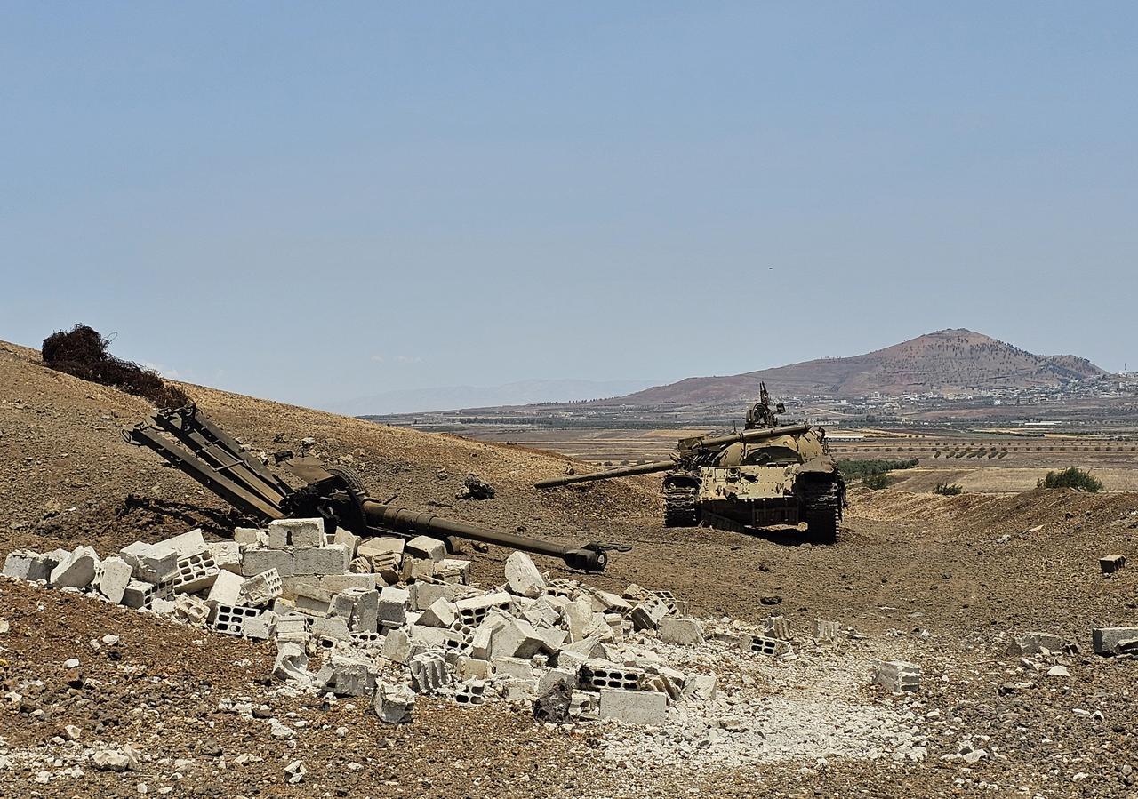 A view of damaged Syrian army tanks and other heavy weapons is seen in the Yarmouk area, after Israeli artillery fire hit the area in response to rockets allegedly launched into Daraa, Syria, on June 04, 2025. (AA Photo)