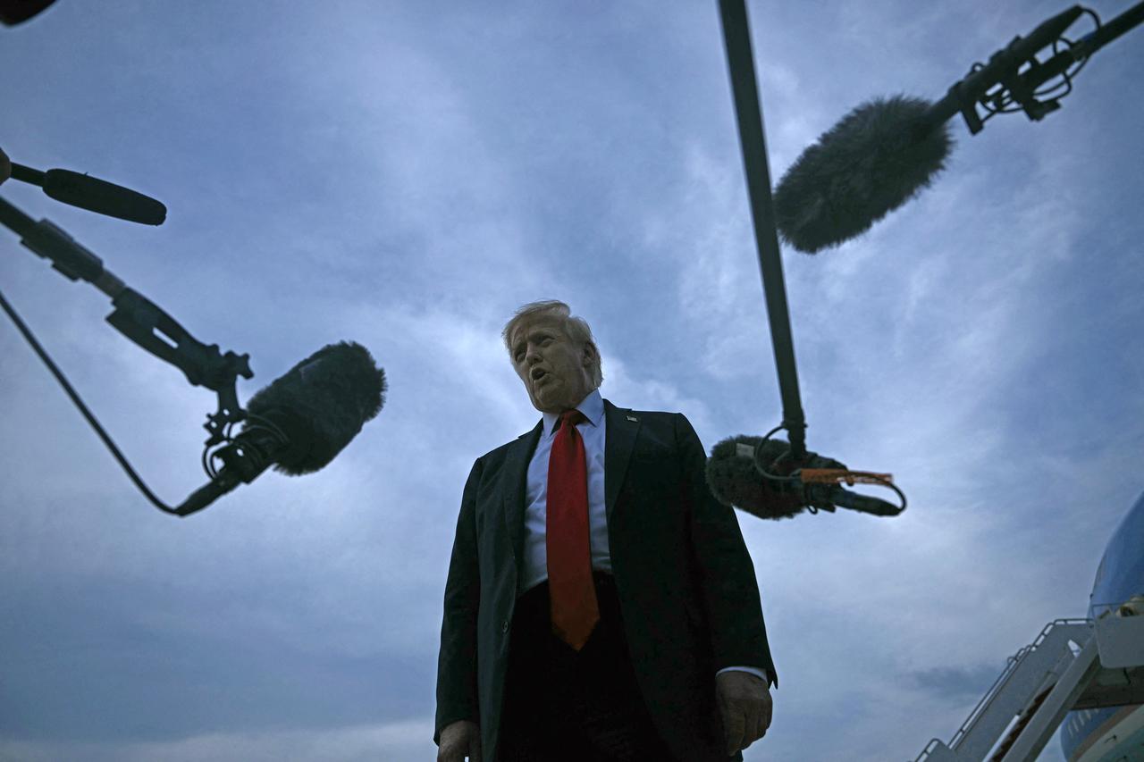 US President Donald Trump speaks with the press upon arrival at Joint Base Andrews in Maryland on July 13, 2025. (AFP Photo)