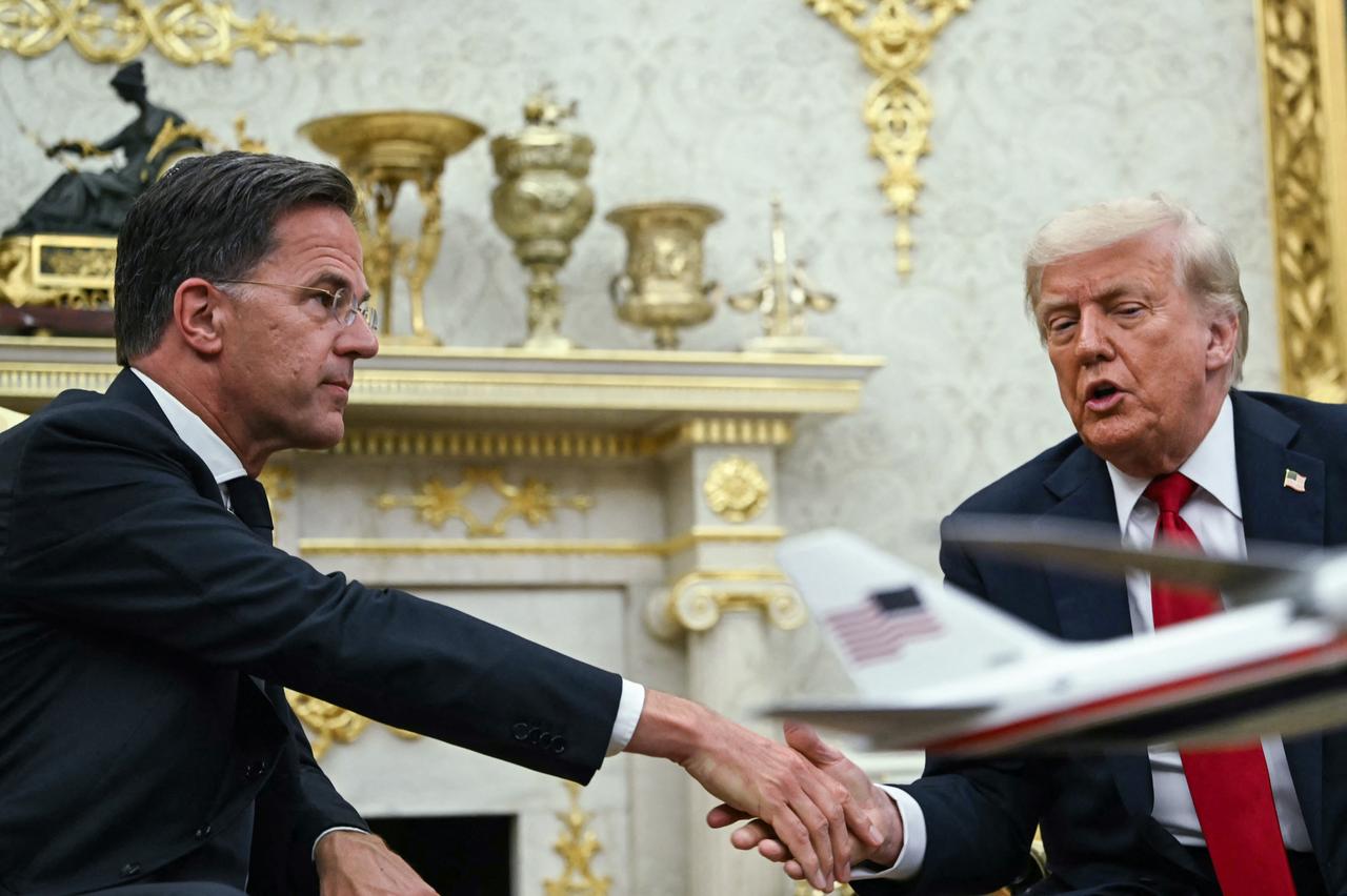U.S. President Donald Trump shakes hands with NATO Secretary General Mark Rutte (L) as they meet in the Oval Office of the White House in Washington, U.S. on July 14, 2025. (AFP Photo)