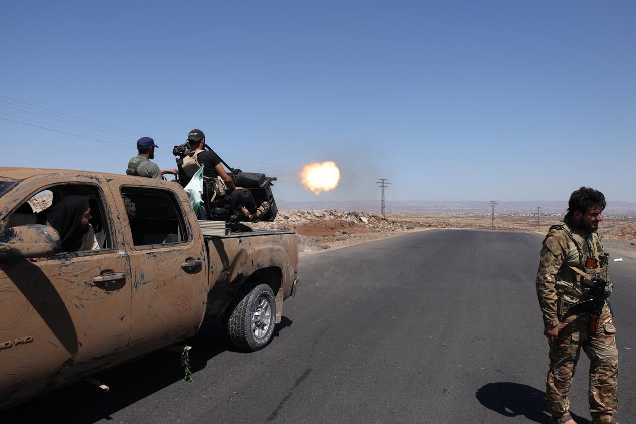 Smoke billows after a reported Israeli strike on the Mazraa area, near Sweida, southern Syria on July 14, 2025. (AFP Photo)