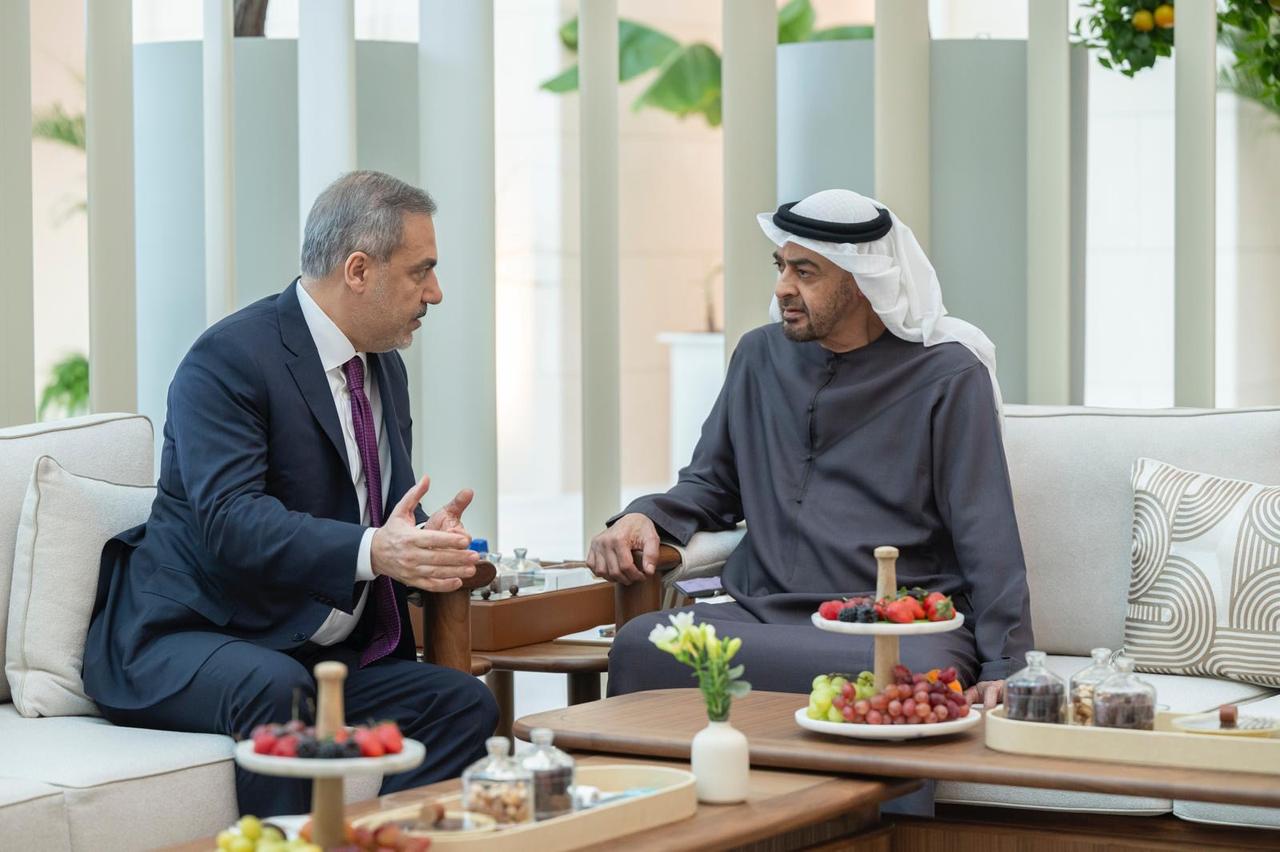 Turkish Foreign Minister Hakan Fidan (L) is being received by United Arab Emirates President Sheikh Mohamed bin Zayed Al Nahyan (R) in Dubai, United Arab Emirates on May 10, 2024. (UAE Presidential Council / AA Photo)