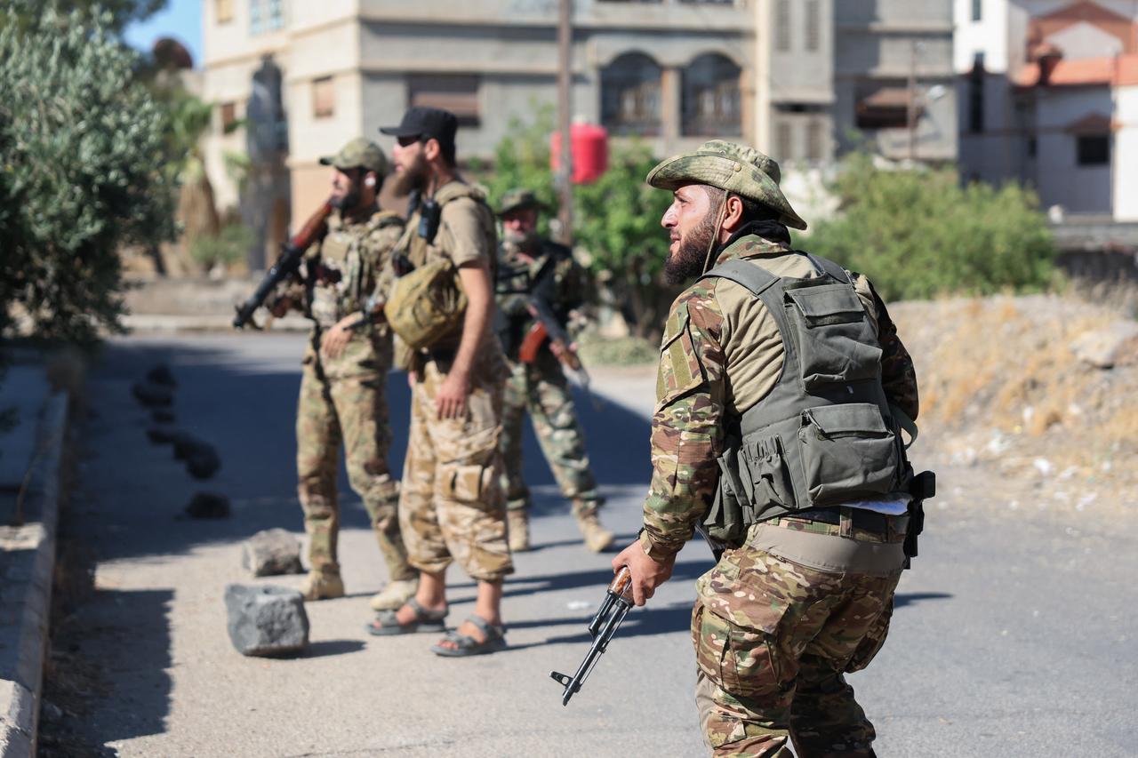 Syrian security forces deploy amid clashes in the southern Sweida city on July 16, 2025. (AFP Photo)