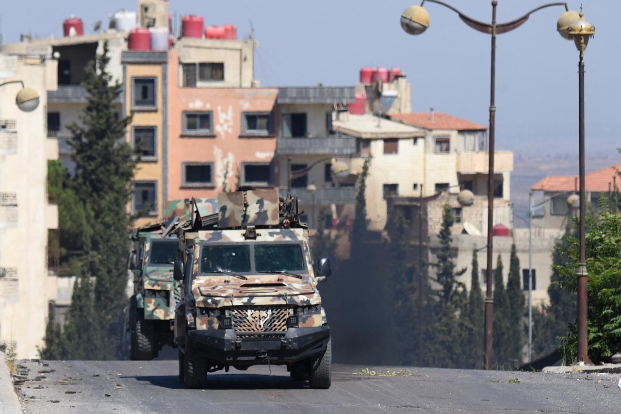 Syrian security forces deploy amid clashes in the southern city of Sweida on July 16, 2025. (AFP Photo)