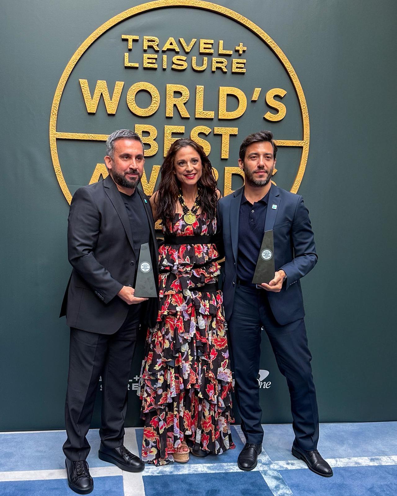 IGA Corporate Communications Director Gokhan Sengul (L) and Advertising, Events and Sponsorship Manager Emrah Akalin (R) receive the award from Travel and Leisure Editor-in-Chief Jacqueline Gifford (C) at the World’s Best Awards ceremony in New York, U.S., July 16, 2025. (AA Photo)