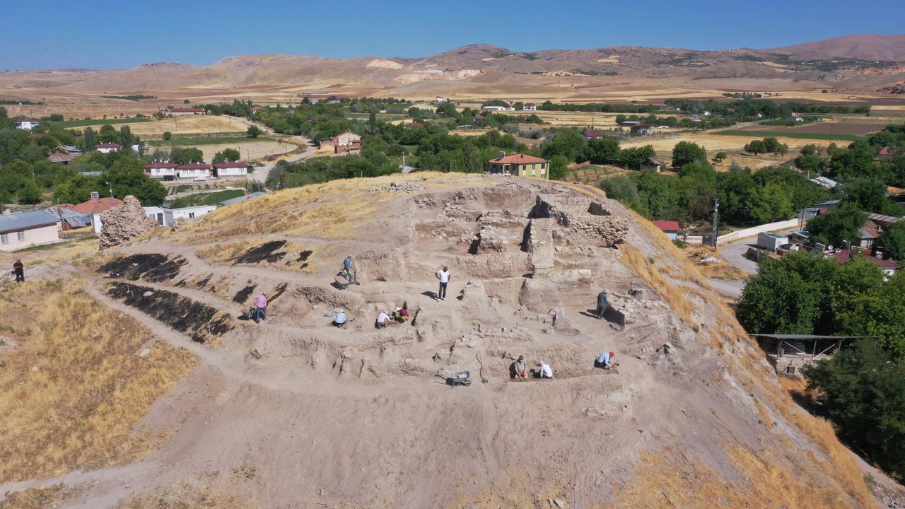 An aerial view of the ongoing archaeological excavations at the 6,000-year-old temple site in Tadim Fortress and Mound, Elazig, Türkiye, July 15, 2025. (AA Photo)