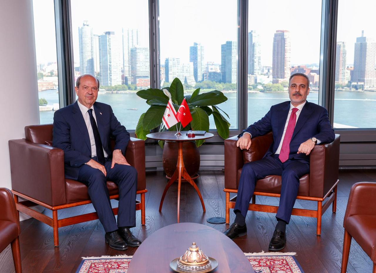 Turkish Foreign Minister Hakan Fidan (R) receives Turkish Cypriot President Ersin Tatar (L) within the Extended Informal Meeting on Cyprus at the Turkish House (Turkevi) in New York, United States on July 16, 2025. (AA Photo)