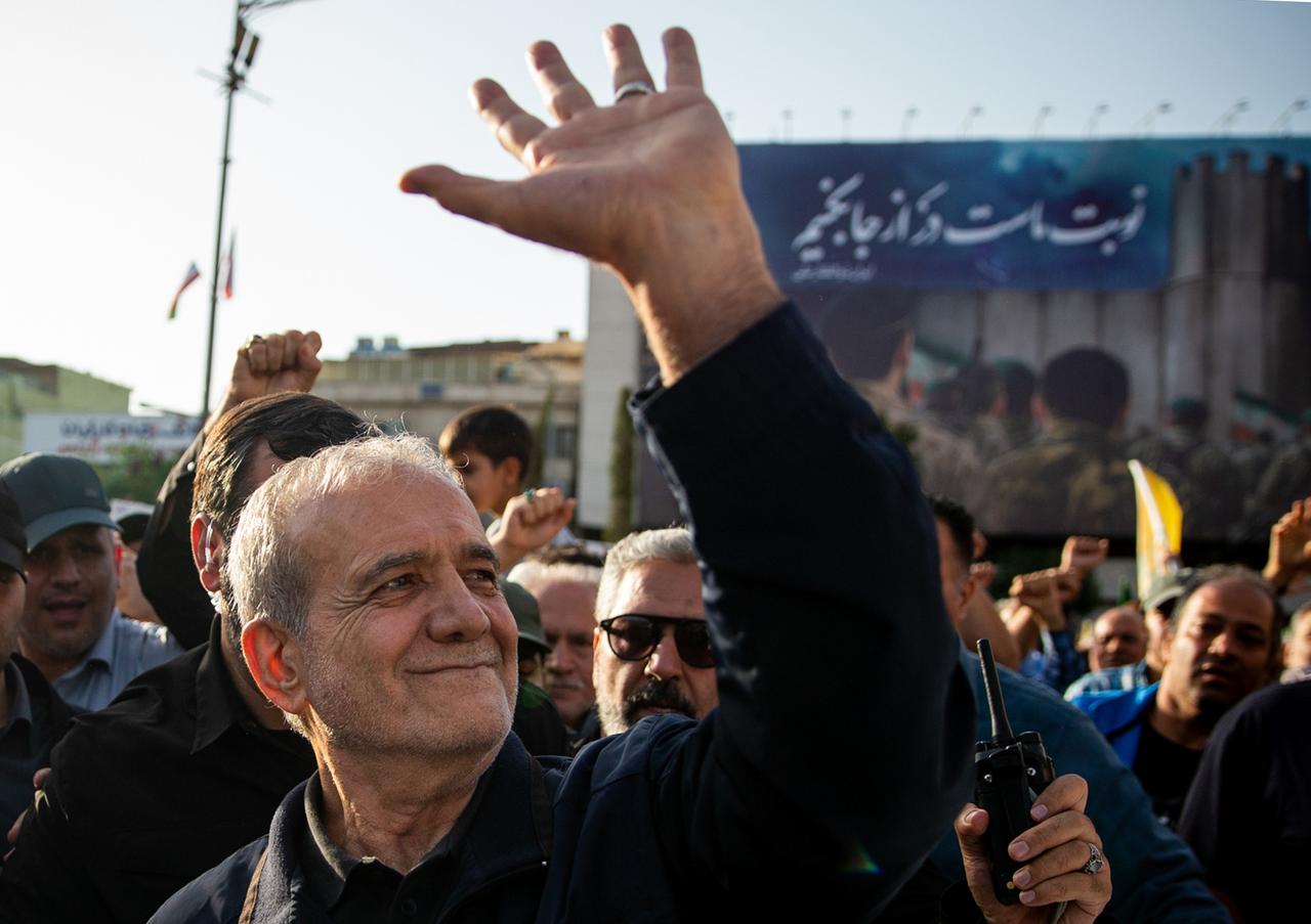 Iranian President Masoud Pezeshkian joins people gathering at the Revolution Square, demanding continued attacks on Israel and a response to the US attacks following the US attack on three Iranian nuclear facilities in Tehran, Iran on June 22, 2025. (Iranian Presidency / Handout/AA)