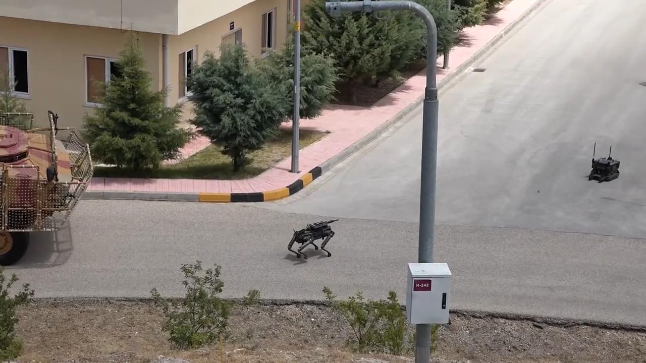 Special Forces teams operate alongside unmanned ground vehicles and armed robot dogs in a simulated building assault operation, accessed on 3 July, 2025. (Photo via YouTube/@TCTurkSilahliKuvvetleri)