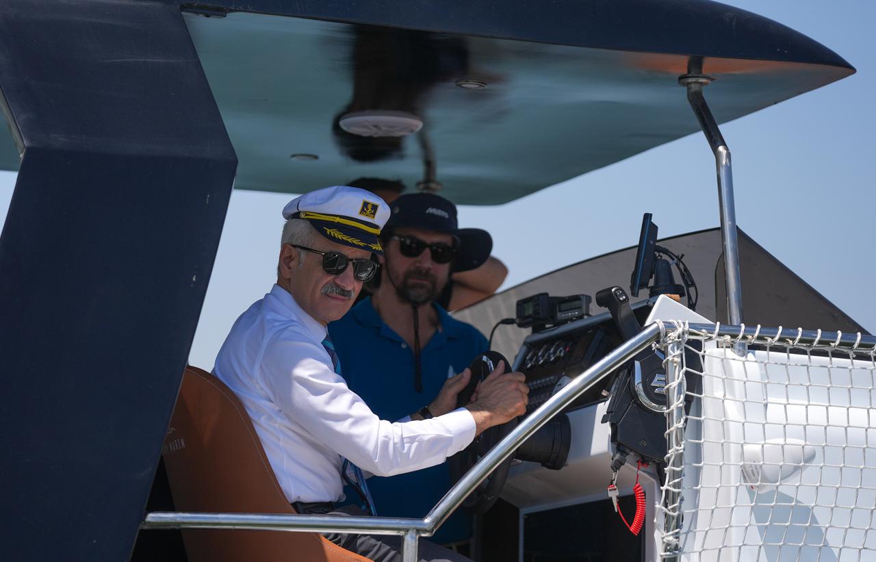 Turkish Minister of Transport and Infrastructure Abdulkadir Uraloglu took a boat tour with seafarers on a lake ahead of a program at the Ankara Sailing Club as part of the International Day of the Seafarer, June 25, 2025. (AA Photo)
